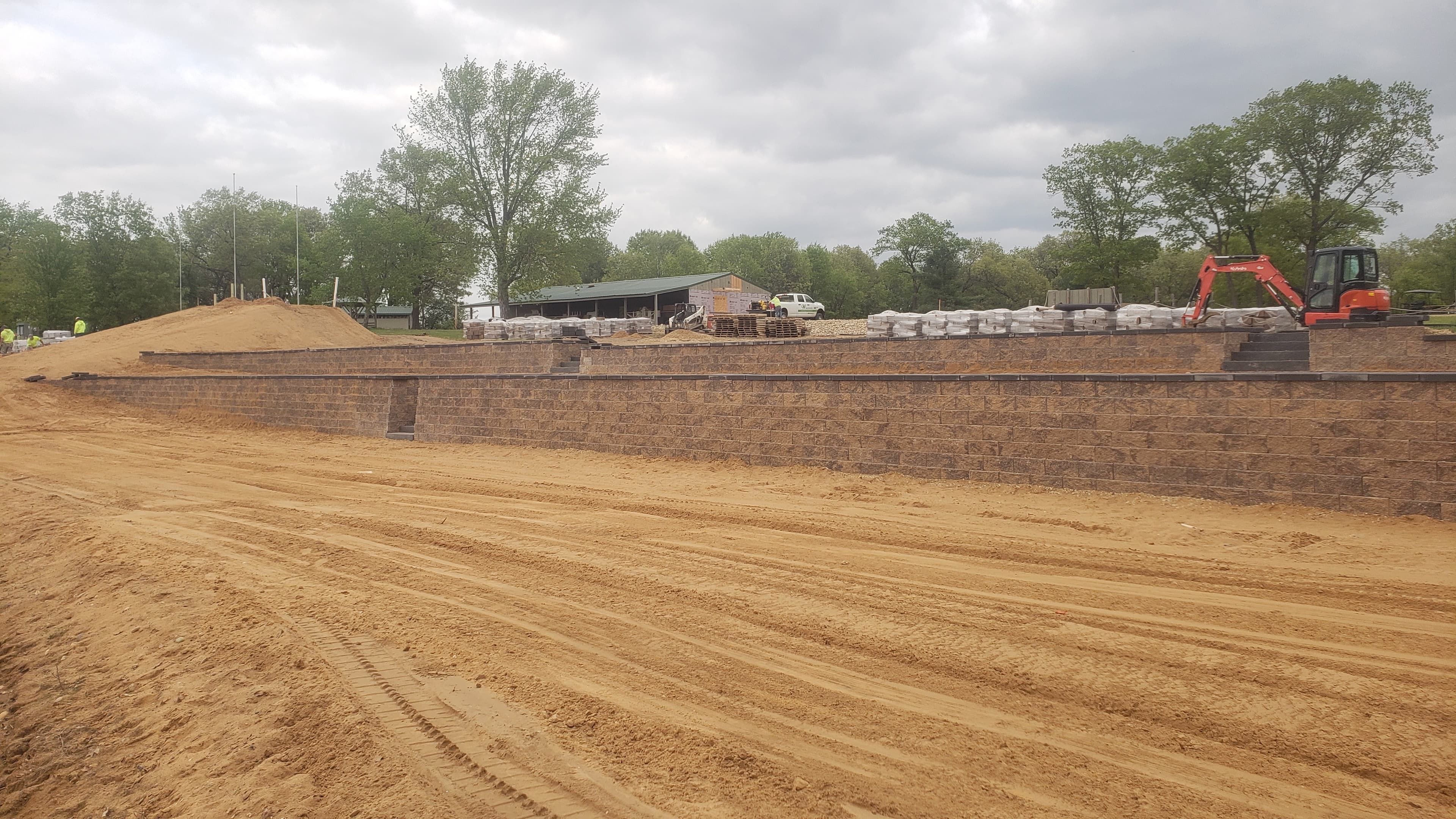 Professional grading and excavation for commercial retaining wall project in Wisconsin