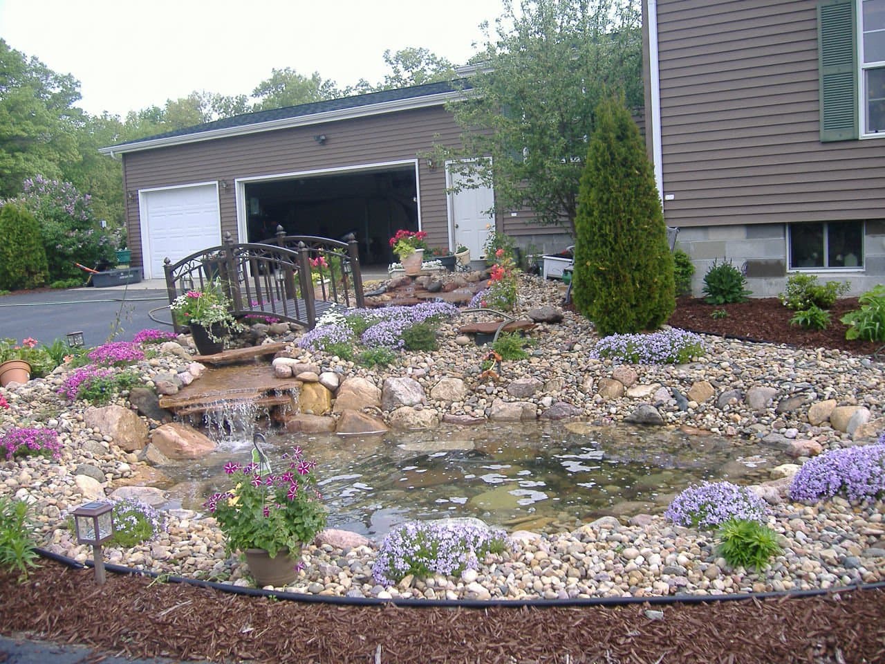 Garden Pond with Waterfall & Bridge in Baraboo, WI - Wisconsin Landscaping Project