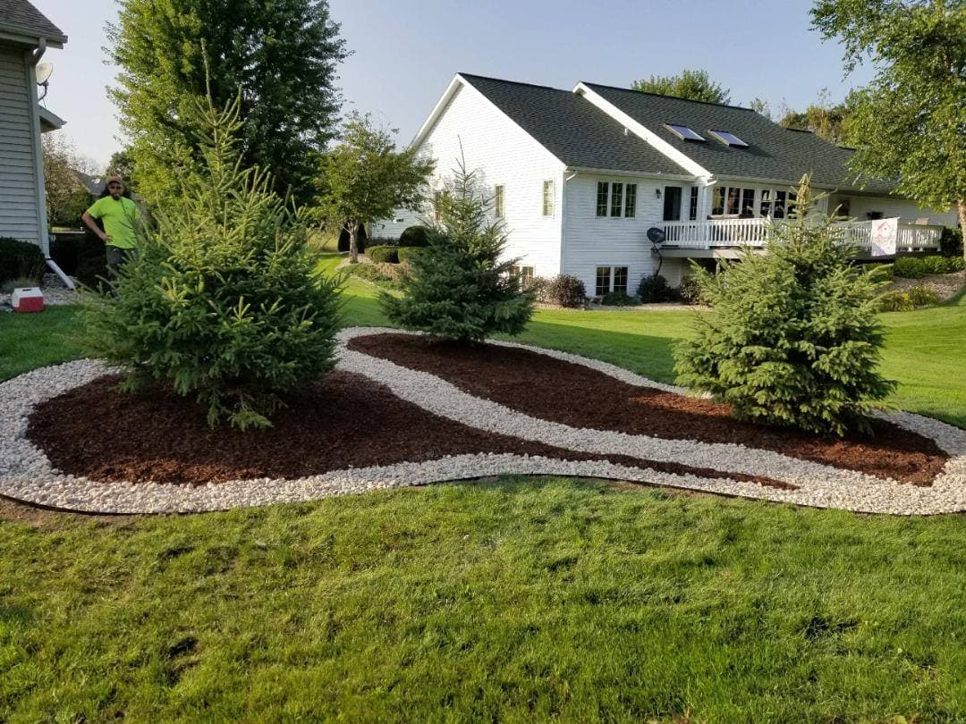 Professional mulching and decorative stone landscaping in Wisconsin