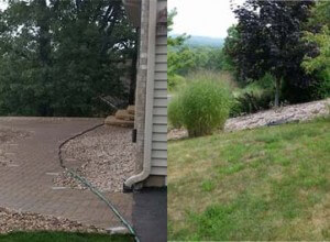 Patio, outdoor lighting, pillars, stone caps, fire pit, sod and plantings