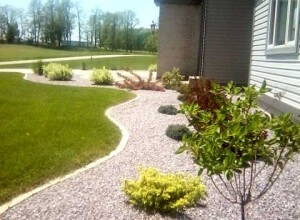 Sodding, retaining walls, plantings bushes, trees, edging