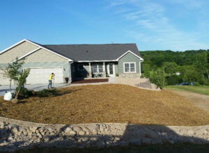 Retaining walls, erosion matting, erosion control, plantings, stone